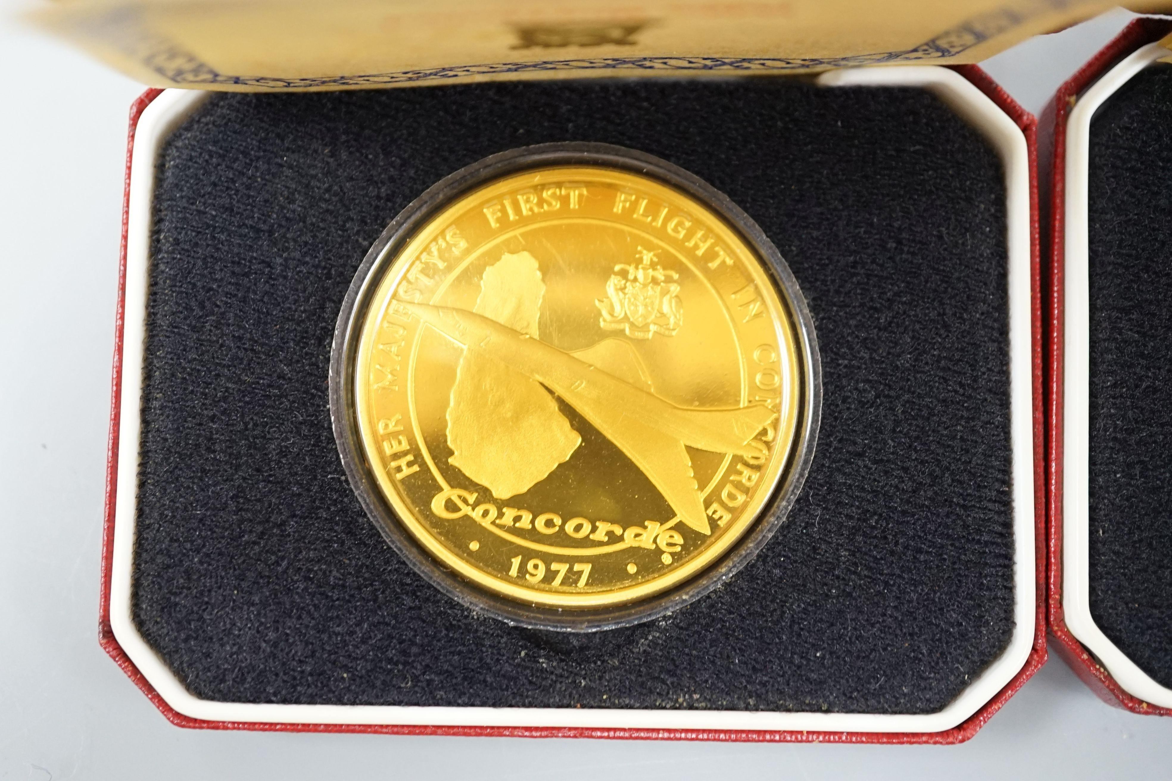 Five assorted cased Pobjoy Mint silver gilt Crown medals struck to commemorate first flights of Concorde, with certificates